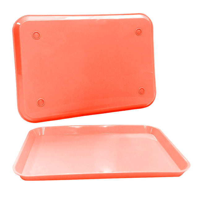 Pink Ritter B flat trays with non-slip grips underneath
